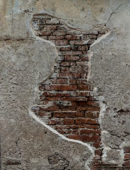 Cracked concrete vintage brick wall background. Archaeological area. Pattern on the wall with space for text, No focus, specifically.