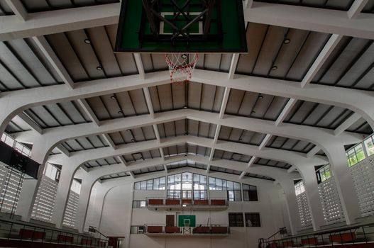Bangkok, Thailand - Oct 04, 2020 : Empty basketball gym. Interior of a basketball hall. Copy space, Selective focus.