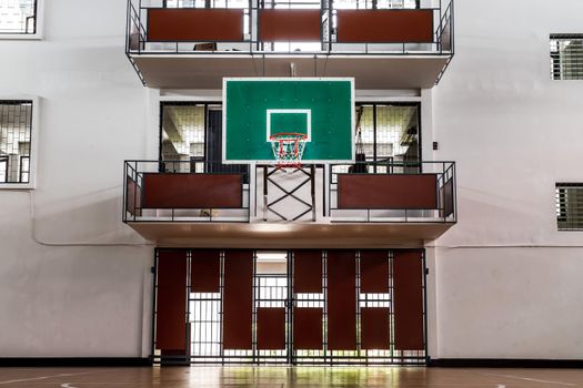 Bangkok, Thailand - Oct 04, 2020 : indoor sport basketball hoop in gym. Interior of a basketball hall. Copy space, Selective focus.