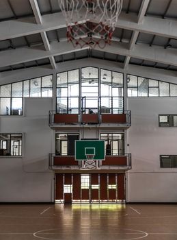 Bangkok, Thailand - Oct 04, 2020 : indoor sport basketball hoop in gym. Interior of a basketball hall. Copy space, Selective focus.