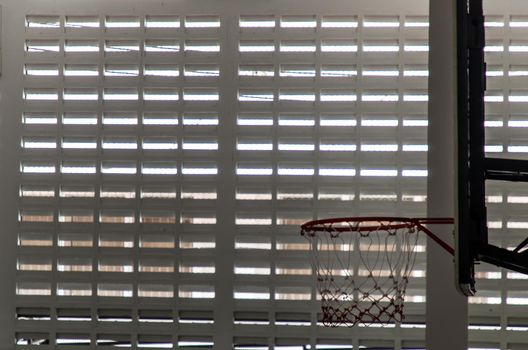 indoor sport basketball hoop in gym. Interior of a basketball hall. Copy space, Selective focus.