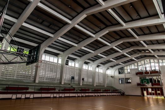 Bangkok, Thailand - Oct 04, 2020 : Empty basketball gym. Interior of a basketball hall. Copy space, Selective focus.