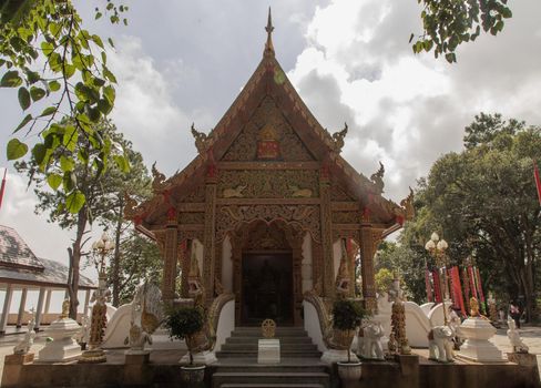 Phra That Doi Tung temple (Wat Phra That Doi Tung). Buddhist monastery and temple of public. Chiang Rai province Thailand. Selective focus.