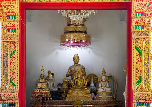 Chiang Rai, thailand - Sep 05, 2020 : The buddha image in main vihan at Phra That Doi Tung temple (Wat Phra That Doi Tung). Buddhist monastery and temple of public. Selective focus.