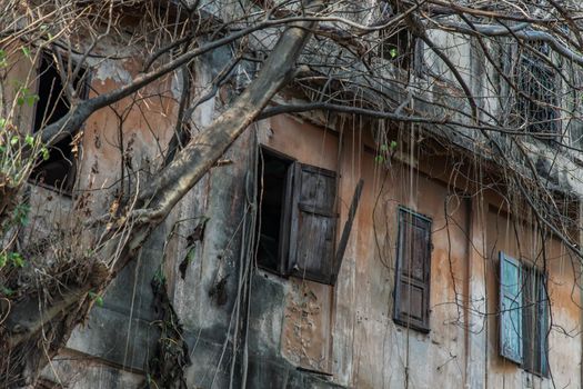 Old wooden windows on the old wall. Traditional Architecture style, Selective focus.