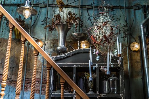 Bangkok, Thailand - Jun 26, 2020 : Interior design and decoration vintage style decorated with old brick wall and wooden staircase, Lamp and Dried flowers. No focus, specifically.