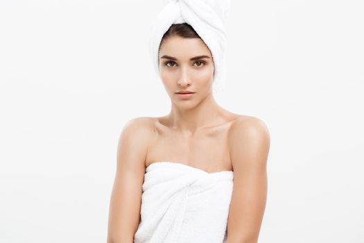 Beauty and Skin care concept -Beautiful caucasian young woman wearing towel after shower.