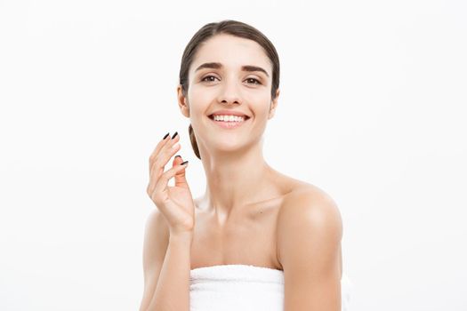 Beauty and Skin care concept -Beautiful caucasian young woman wearing towel after shower.