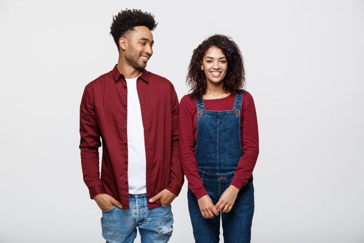 Beautiful portrait of a happy African American couple isolated over white.