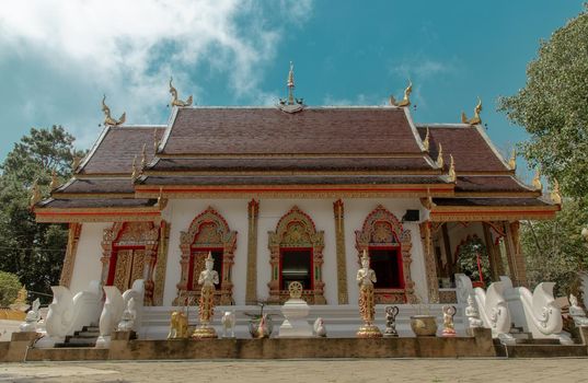 Phra That Doi Tung temple (Wat Phra That Doi Tung). Buddhist monastery and temple of public. Chiang Rai province Thailand. Selective focus.
