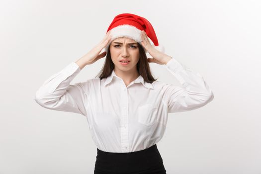 Business Concept - Modern caucasian business woman in christmas theme with serious thoughtful pose.