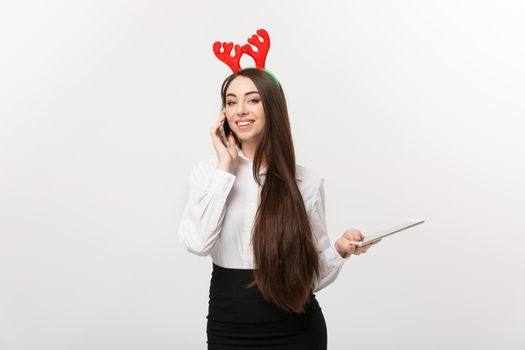 Business Concept - young caucasian business woman talking onmoblie phone with happy facial expression.