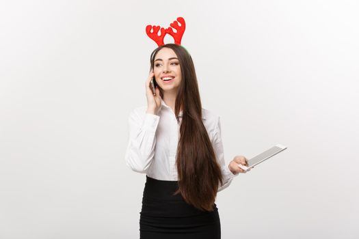 Business Concept - young caucasian business woman talking onmoblie phone with happy facial expression.