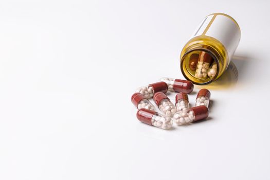 medicine medical preparation in capsules on a white background. High quality photo