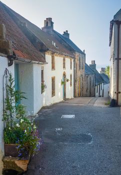 Picturesque Narrow Winding Street Of Terraced Houses In A Small Coastal Village In Scotland