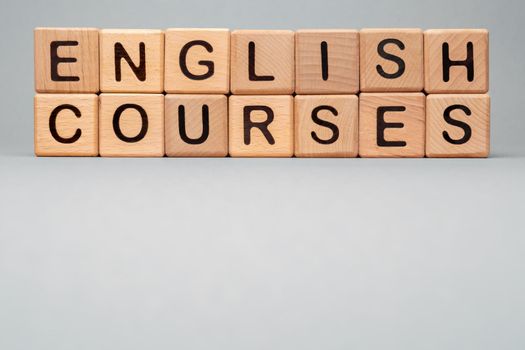 Speak English Courses icon words block wooden cubes concept foreign language tutoring. Wooden block toy cubes concept learning English Courses training. Language Courses English online learn icon cube