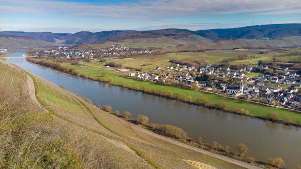 Aerial view of the river Moselle valley with vineyards and the villages Brauneberg and Muelheim 