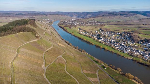 Aerial view of the river Moselle valley with vineyards and the villages Brauneberg and Muelheim 