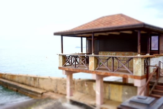 Seascape with a view of the Sudak embankment. Crimea