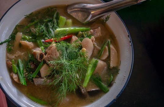Pork Bone and vegetables in miso soup (Fermented soybeans). Thai food. Selective focus.