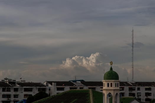 Aerial view of Mosque (Muslim mosque) at sunset in Bangkok, Islamic mosque dome, Green mosque dome, Copy space, Selective focus.