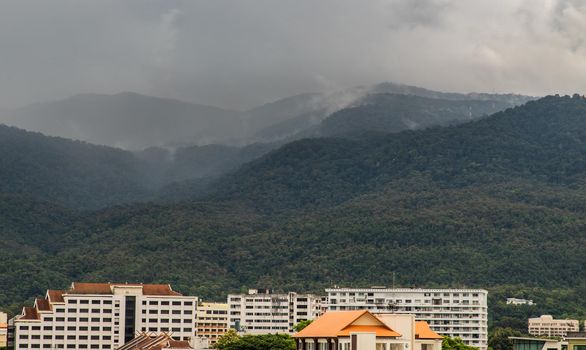 View City in Chaing mai and Doi Suthep mountain in background at Thailand. No focus, specifically.