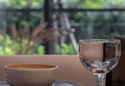 Close up picture of empty glasses in dinning room. Part of interior.