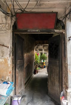 The light that shines down at the old wall of narrow street in the old wooden village. No focus, specifically.