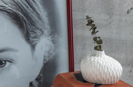 Bangkok, Thailand - Sep 26, 2020 : Dried flowers in Handmade Ceramic Vases and books on table. Home decor, Space for text.