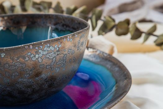 Detailed of ceramics set bowl with Dried flowers on Calico. Beautiful arrangement.