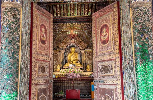 Lampang, Thailand - Sep 04, 2019 : The buddha image within Sri Chum Temple Is an old Burmese style architecture. Selective focus.