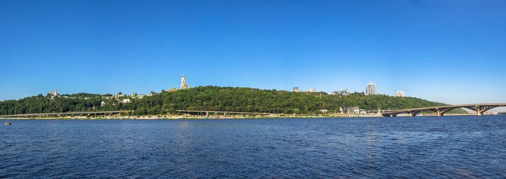 Kyiv, Ukraine 07.11.2020. View of the left bank and the Dnieper river in Kyiv, Ukraine, on a sunny summer morning