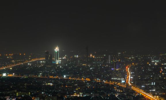 Bangkok, thailand - Nov 07, 2020 : Bangkok downtown cityscape with skyscrapers at night give the city a modern style. No focus, specifically.