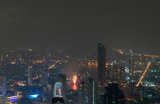 Bangkok, thailand - Nov 07, 2020 : Bangkok downtown cityscape with skyscrapers at night give the city a modern style. No focus, specifically.