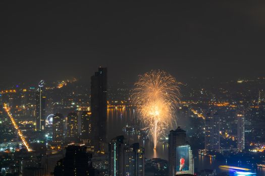 Bangkok, thailand - Nov 07, 2020 : Stunning aerial view of Fireworks light up sky from Boats cruise up the Chao Phraya River with free space for text. Celebration, No focus, specifically.