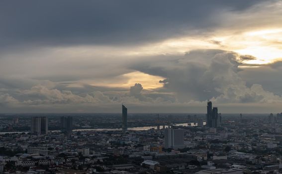 Bangkok, thailand - Sep 09, 2020 : Bangkok downtown cityscape with skyscrapers and Beautiful sky line along Chaopraya river in the evening. Focus and blur.