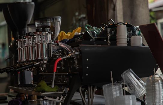 Coffee machine in cafe shop. Vintage color tone. No focus, specifically.