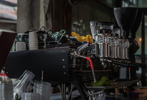 Coffee machine in cafe shop. Vintage color tone. No focus, specifically.
