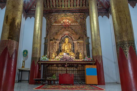 Lampang, Thailand - Sep 04, 2019 : The buddha image within Sri Chum Temple Is an old Burmese style architecture. Selective focus.