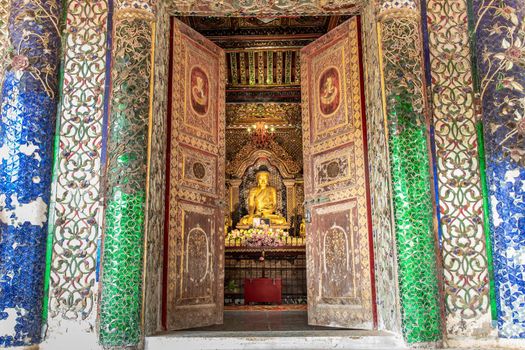 Lampang, Thailand - Sep 04, 2019 : The buddha image within Sri Chum Temple Is an old Burmese style architecture. Selective focus.