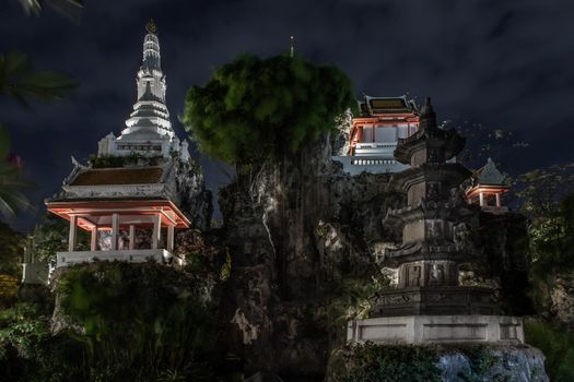 Bangkok, Thailand - 25 Jan 2020 : Khao Mo, The pagoda and pavilion on small mountain in garden that have many turtle of Wat Prayurawongsawas Warawihan.