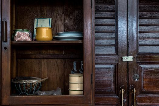 Interior design in Thai style with Wooden dresser classic and Food container, Thai Style architecture.