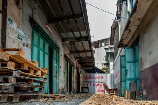 Bangkok, Thailand - Jan 19, 2020 : External of old house was left to deteriorate over time, Chinese Architecture style, Abandoned house, Destroyed house, Ruined house.