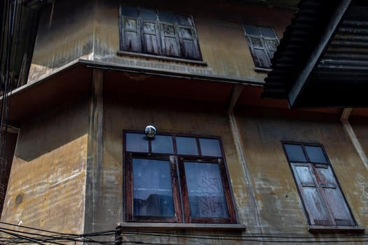 Bangkok, Thailand - Jan 19, 2020 : External of old building was left to deteriorate over time, Chinese Architecture style, Abandoned house, Destroyed house.