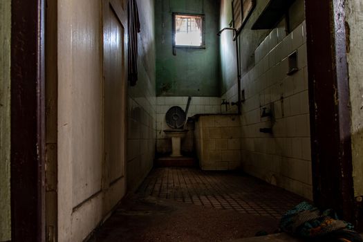 Bangkok, Thailand - Jan 19, 2020 : Abandoned old toilet to deteriorate over time, Abandoned house, Destroyed house, Ruined house.