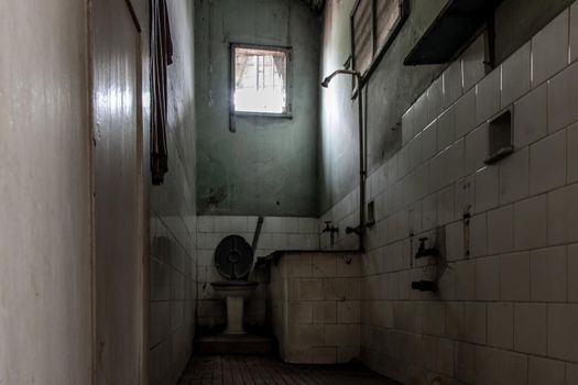 Bangkok, Thailand - Jan 19, 2020 : Abandoned old toilet to deteriorate over time, Abandoned house, Destroyed house, Ruined house.