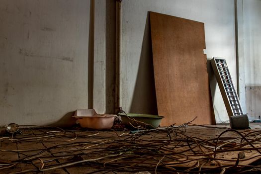 Bangkok, Thailand - Jan 19, 2020 : Abandoned room with baby bath was left to deteriorate over time, Abandoned house, Destroyed house, Ruined house.