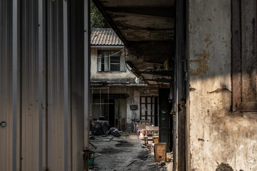 Bangkok, Thailand - Jan 19, 2020 : External of old house was left to deteriorate over time, Chinese Architecture style, Abandoned house, Destroyed house, Ruined house.