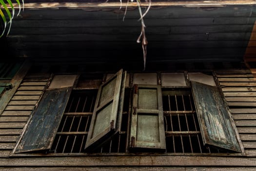 Bangkok, Thailand - Jan 19, 2020 : External of old building was left to deteriorate over time, Chinese Architecture style, Abandoned house, Destroyed house.