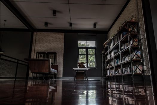 Bangkok, Thailand - 15 Dec 2019 : Minimalist modern living room with leather sofa and brick wall in loft style, Selective focus.